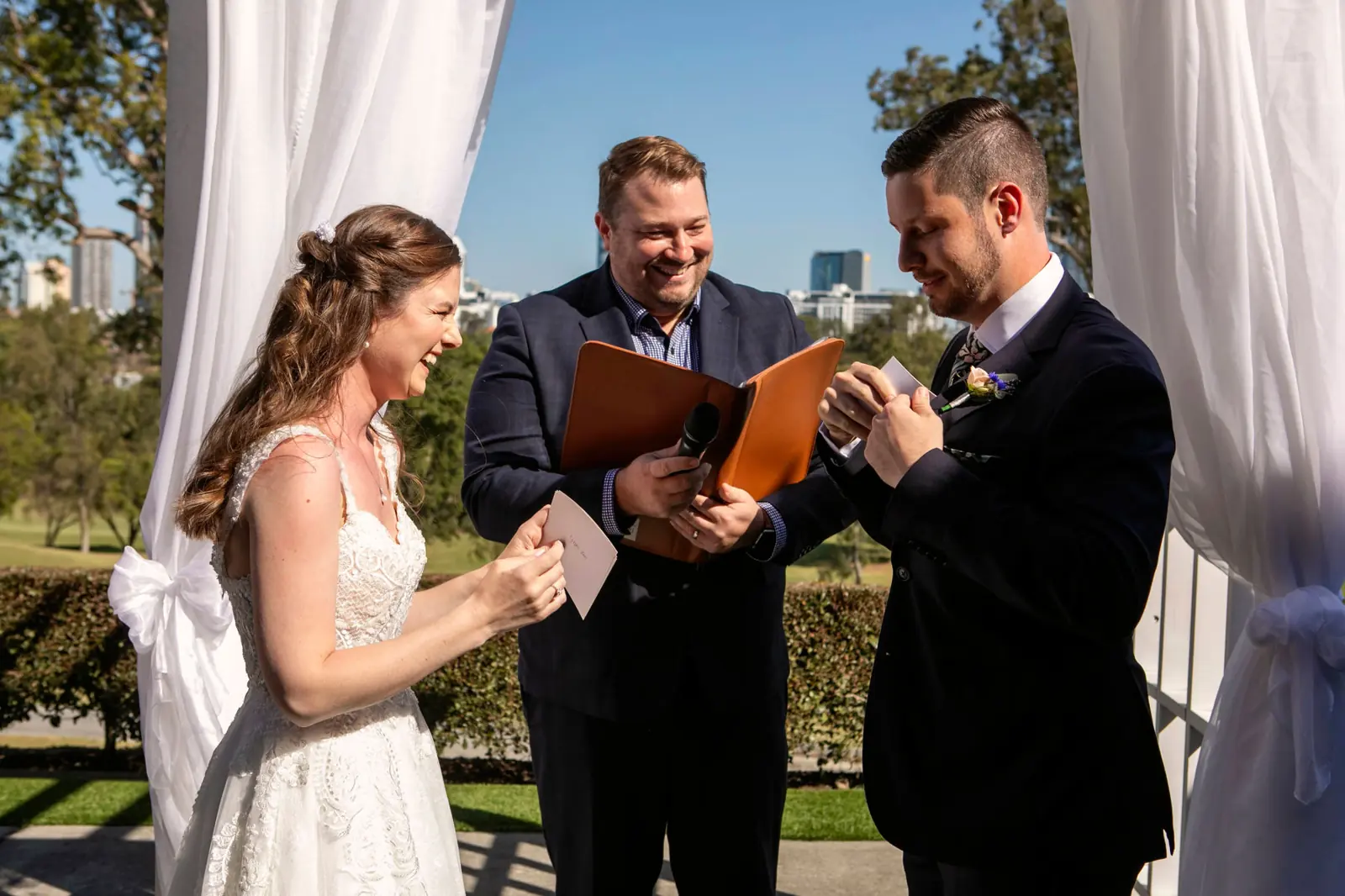 Ben reading vows with a couple in Herston, Brisbane